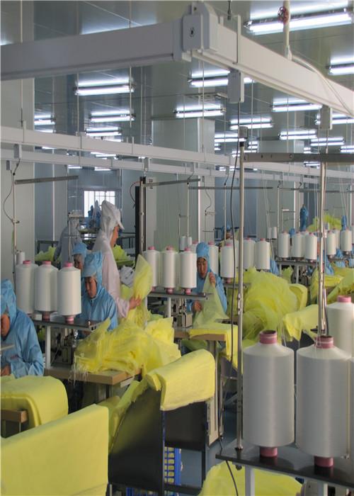 De veelkleurige Medische Isolatie kleedt Poly Met een laag bedekt met Vloeibare Bestand